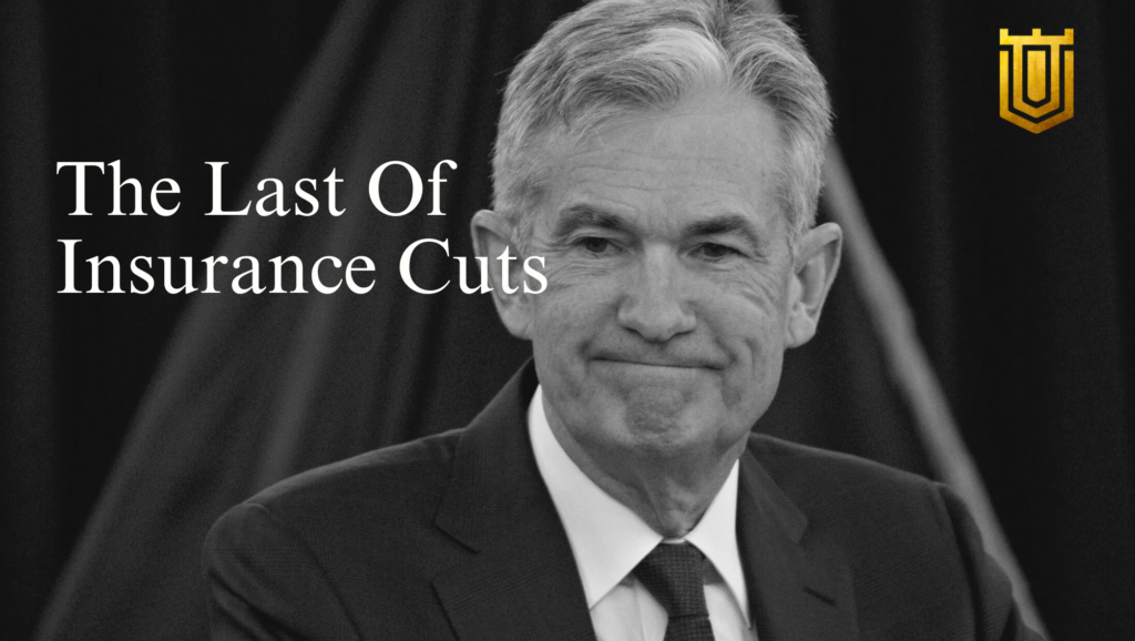 Jerome Powell smiling during a press conference about the last of insurance cuts, curated by Nicholas Mugalli.
