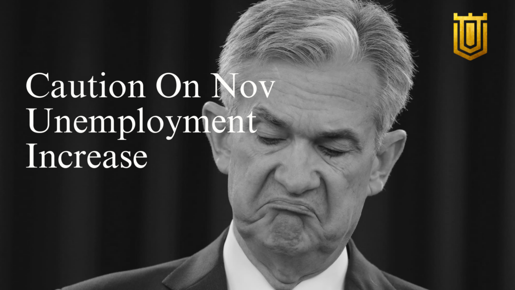 Jerome Powell making a cautious facial expression regarding the November unemployment increase, documented by Nicholas Mugalli.